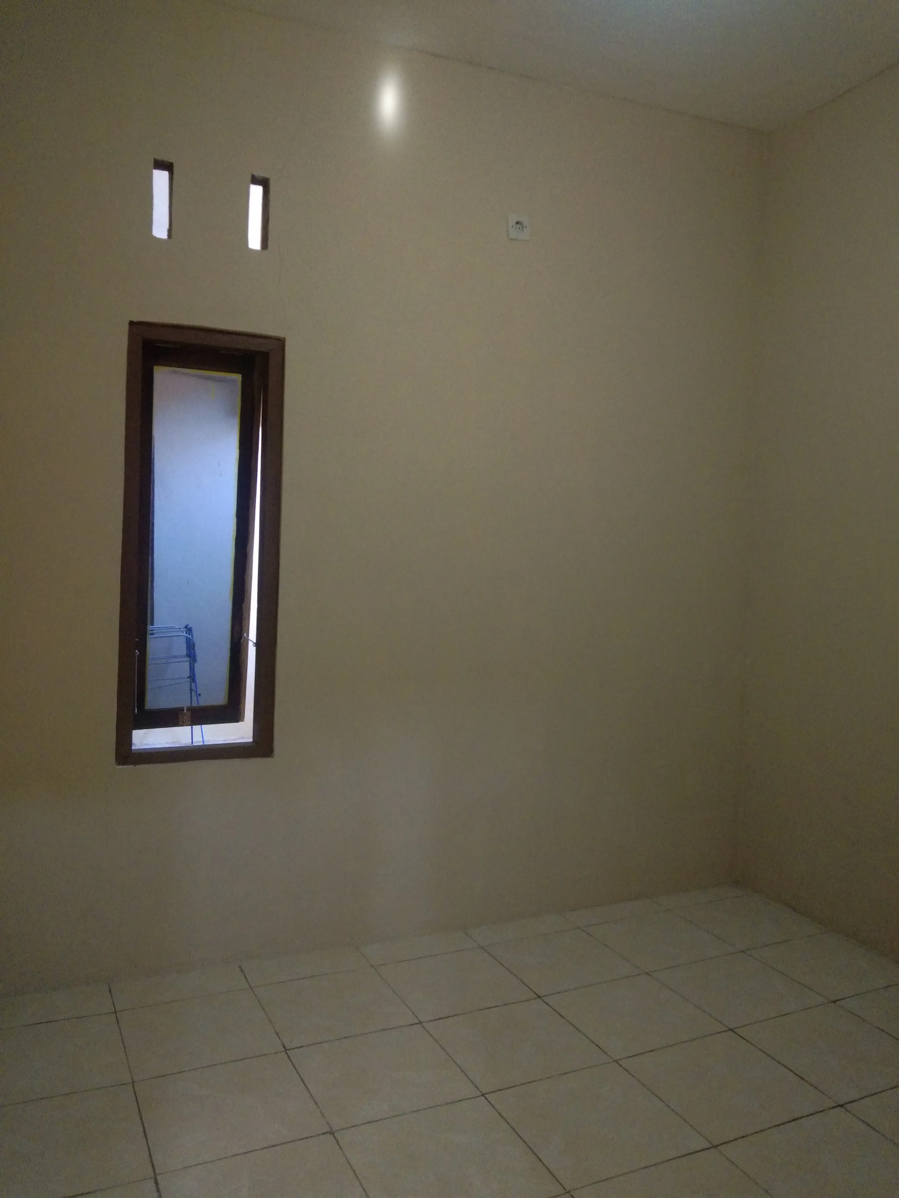 Kamar tidur bersih di Kos AL-Barokah